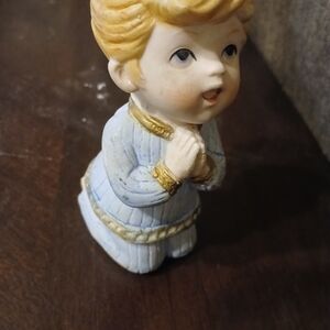 Kneeling Child Figurine with Gold Accents